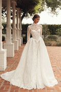 Close-up of Mimosa by Julie Vino Jolie MB27-21 lace corset wedding dress styled with a high-neck topper and long illusion lace sleeves.