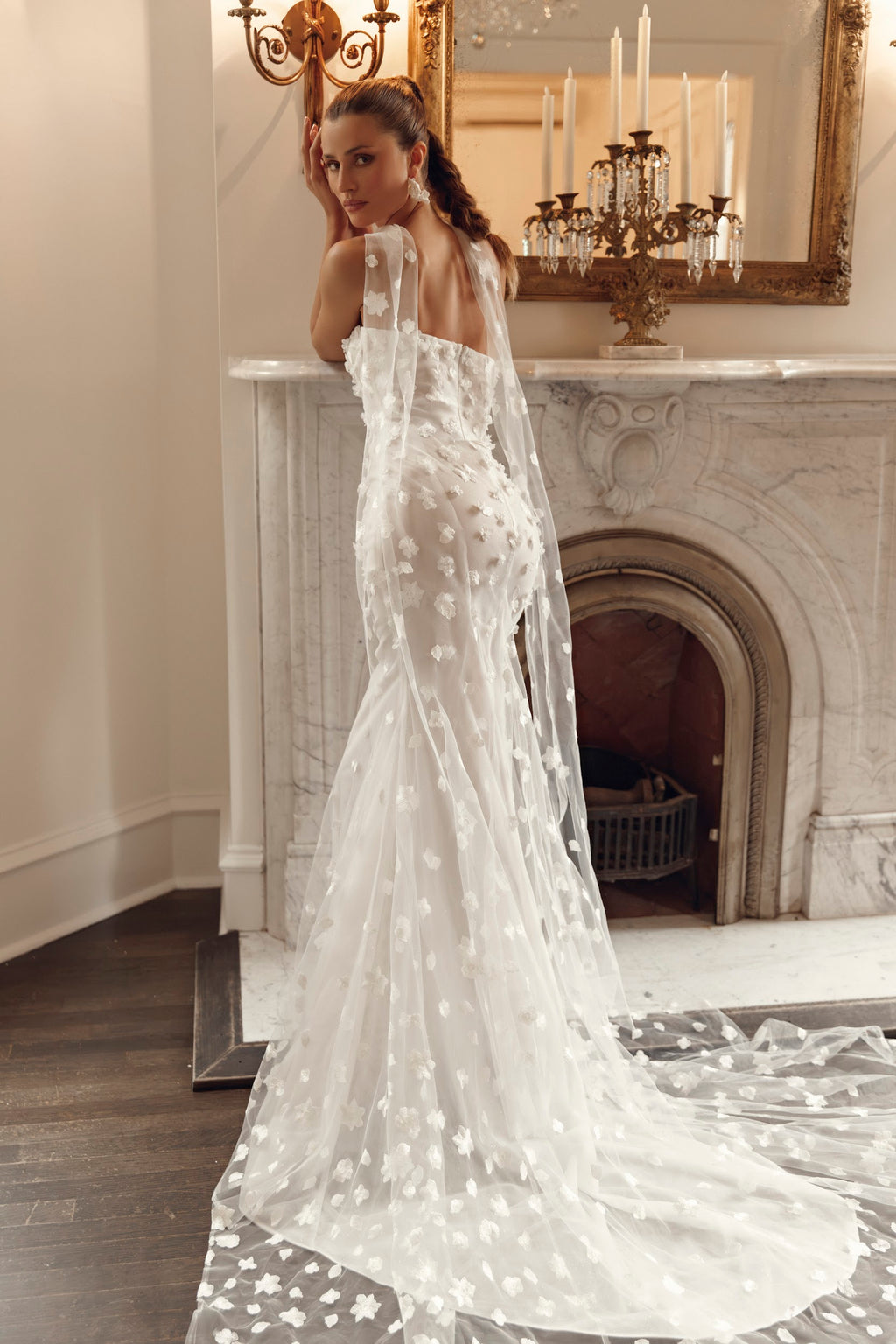 Back view of Mimosa by Julie Vino Louisa MB27-28 floral wedding dress with covered buttons and a flared skirt, styled with sheer floral streamers.