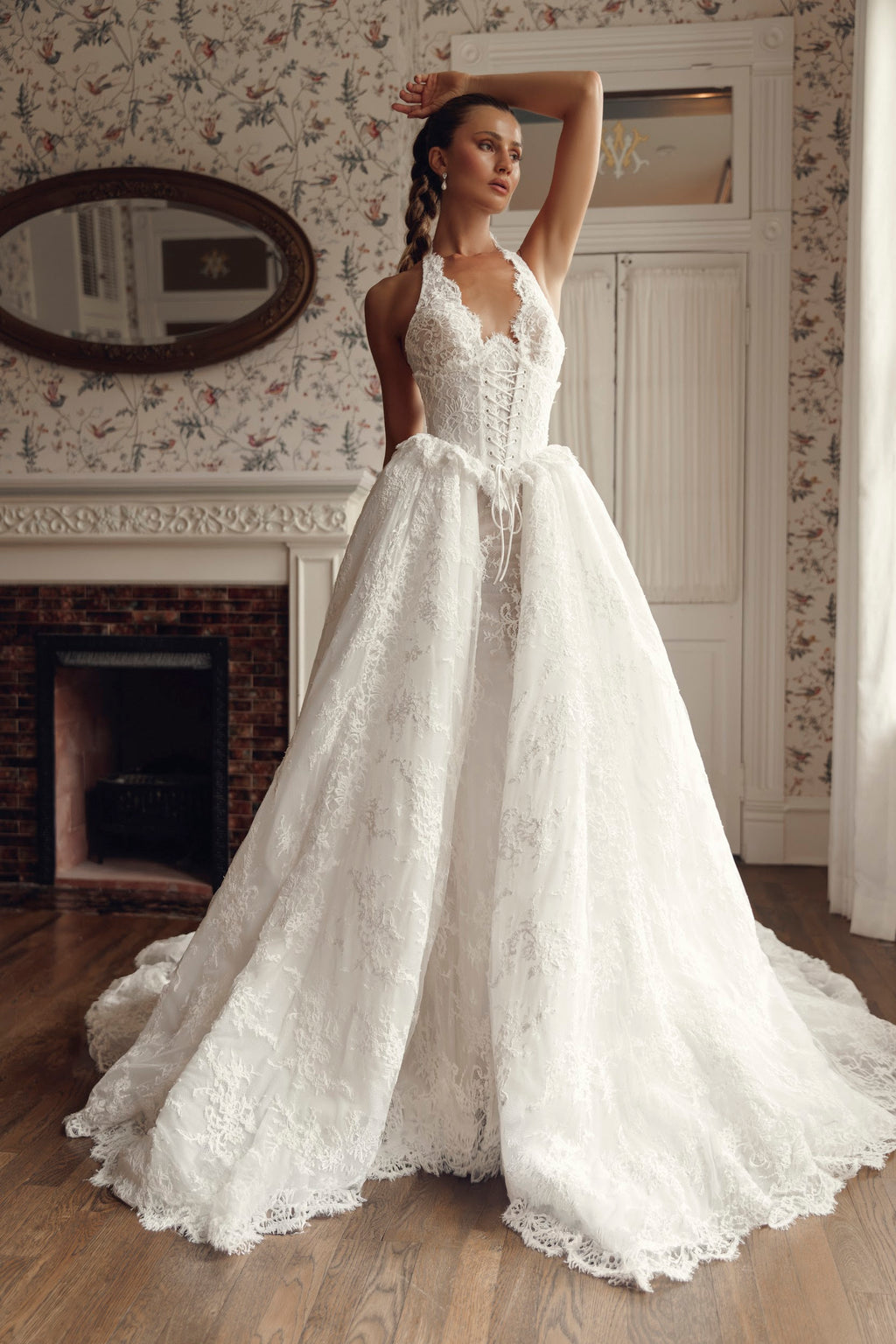 Mimosa by Julie Vino Avianna MB27-29 halter lace wedding dress styled with a front-laced corset layer and full open-front lace overskirt.