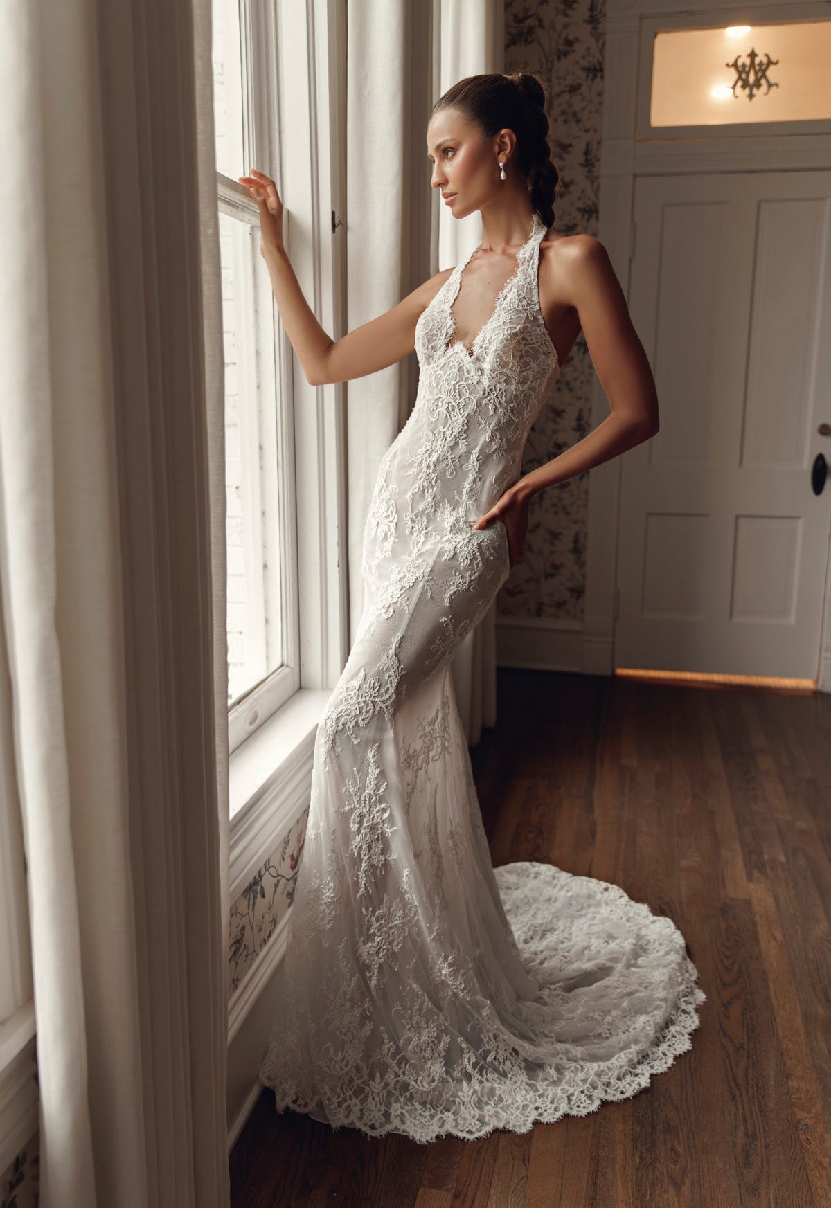Mimosa by Julie Vino Avianna MB27-29 fitted floral lace wedding dress with a plunging halter neckline, softly flared skirt and scalloped lace train.