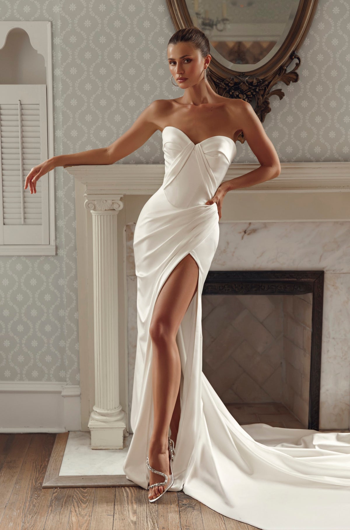 Front view of Noemi PR27-29 by Pure by Julie Vino, showing the strapless sweetheart bodice, diagonal folds, draped hips and high leg slit.
