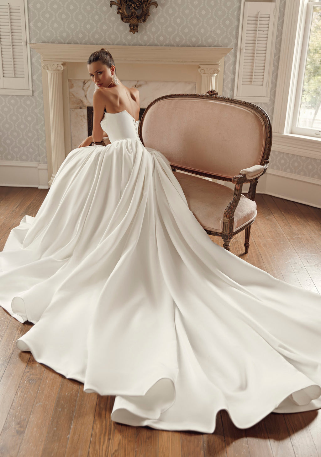 Front view of Iliana PR27-32 by Pure by Julie Vino, showing the lace-trimmed sweetheart neckline, elongated basque waist and full gathered skirt.