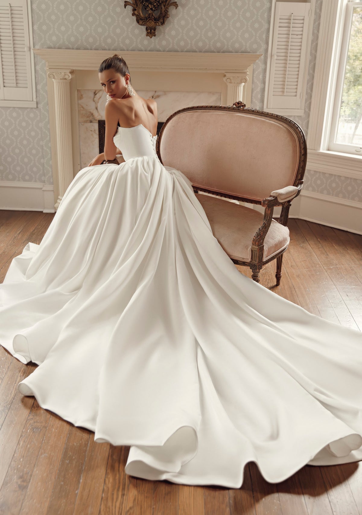 Front view of Iliana PR27-32 by Pure by Julie Vino, showing the lace-trimmed sweetheart neckline, elongated basque waist and full gathered skirt.